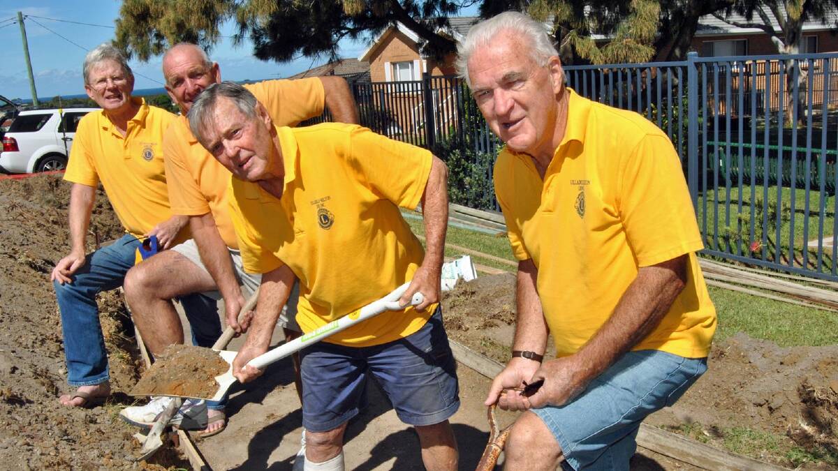 MEN AT WORK: Member of the Ulladulla Lions Club’s Dad’s Army, Norman Smith, Brian Thompson, Peter Shadwell and Jim Oliver work on building a looped walking and cycling track on the edges of Budawang Public School.