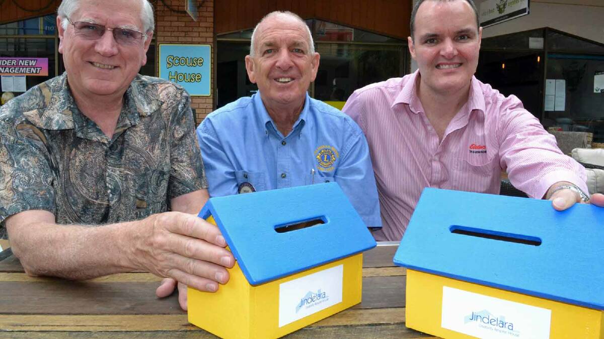 UNITED EFFORT: Service club representatives Brian Morrison from Rotary, Brian Thomson from Lions and Matt Dell from Apex with the blue and yellow cottages used to raise money for the Lions-Ulladulla District Community Foundation and respite care facilities.