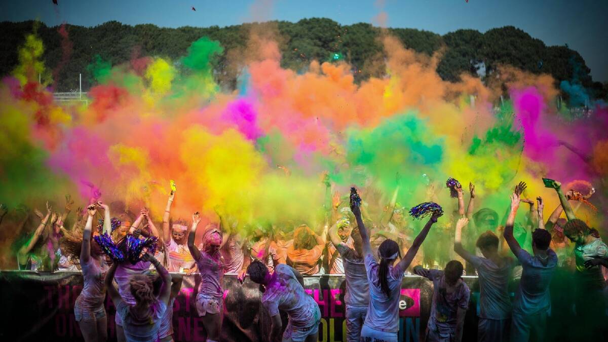 RAINBOW RIOT: Colourful participants in the recent Sydney Colour Run which raised funds for the Cure for Life Foundation. Photo: MJC Wilkie Productions.